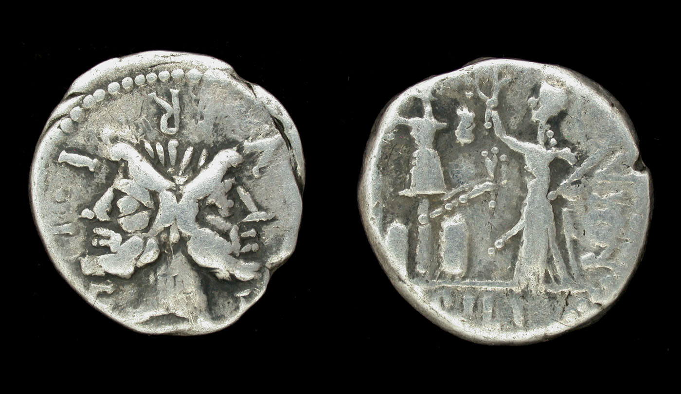 M Furius Lf Philus, Denarius, Roma with Trophy reverse